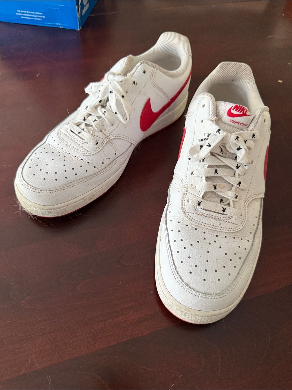 Nike Court Vision low Men’s White with Red Swoosh with playboy print laces.